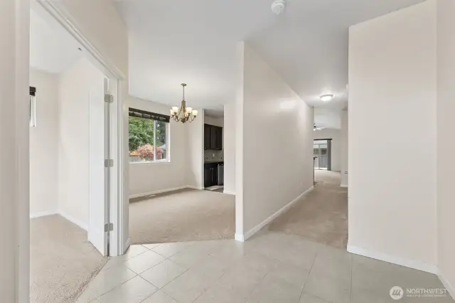 Dining / Flex area with wet bar/ butlers pantry with sink and fridge