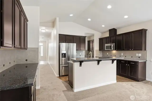 Kitchen with vaulted ceilings, SS appliances