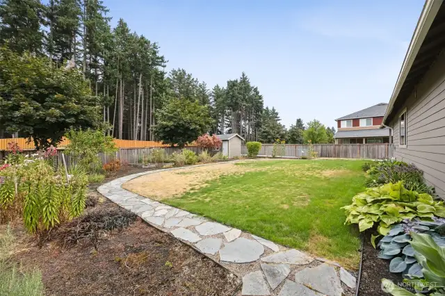 large, nicely landscaped fenced yard