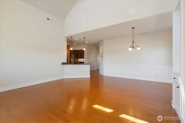 Soaring vaulted ceilings create an open, expansive feel—bringing in natural light and enhancing the home's architectural charm.