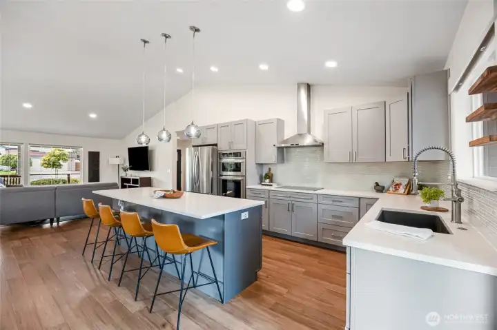 This is what everyone wants in a kitchen! Large island and beautiful cabinetry