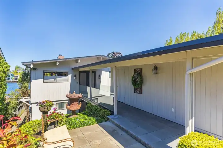 Level entry home and covered from garage.