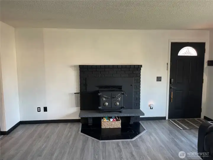 Living room wood burning fire place.