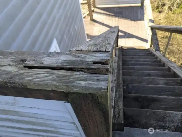 Rotted wood on the deck railing
