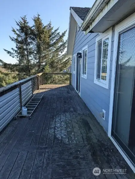 Deck needs pressure washing/repairs