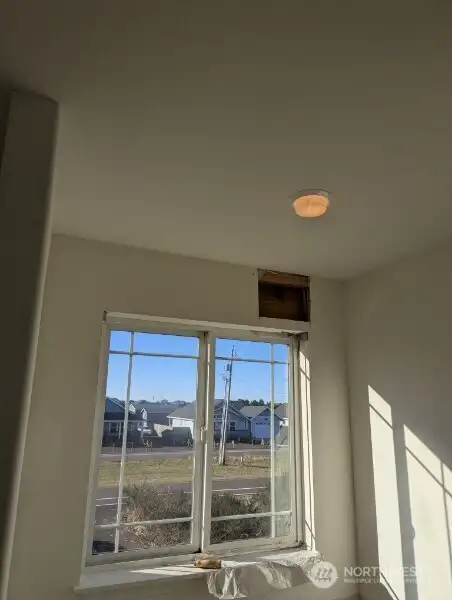 Water damage over window in primary bath