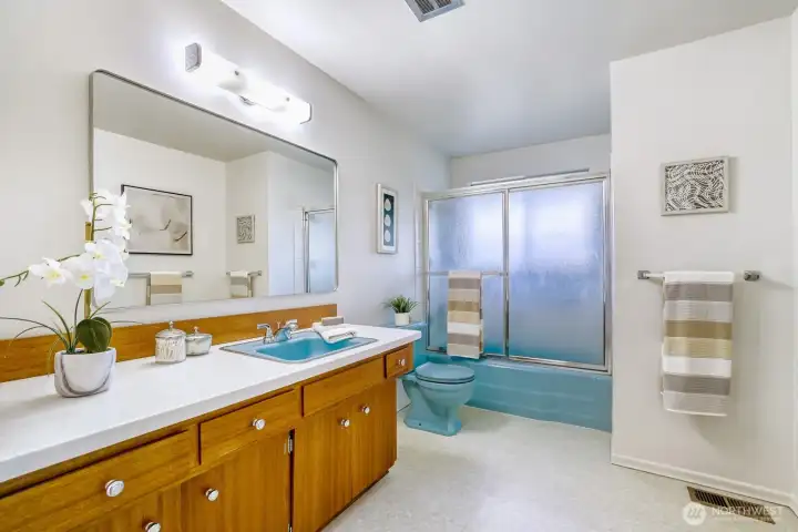 This vintage main bathroom has great character.