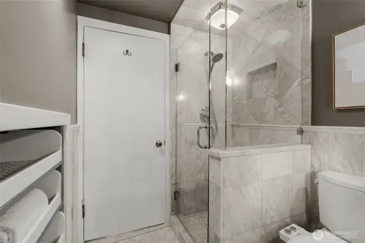 Glass surround shower
