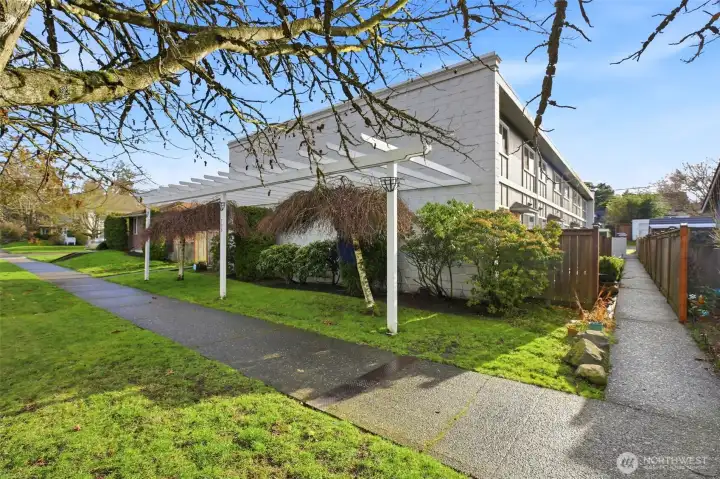 Eight unit complex, with entrance on the west side of the building to access unit 2.