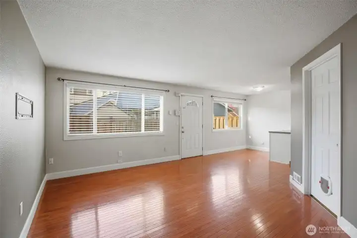 Utility is off the greatroom, includes a stackable washer/dryer combo.