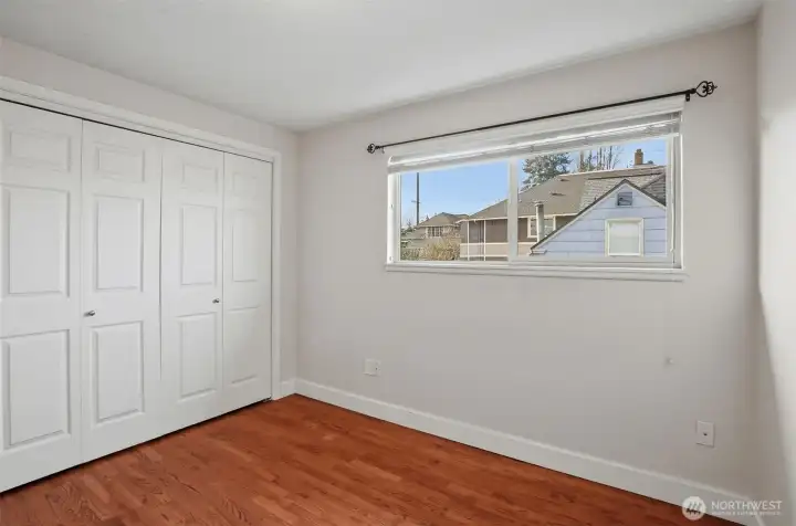 Bedroom two with generous closet space.
