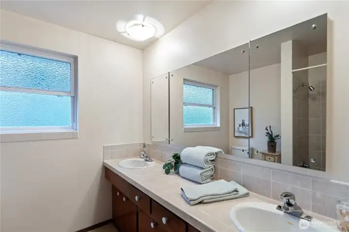 Upper floor full bathroom with tub