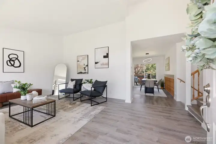 You're greeted with vaulted ceilings, lots of natural light and luxury vinyl plank flooring throughout.