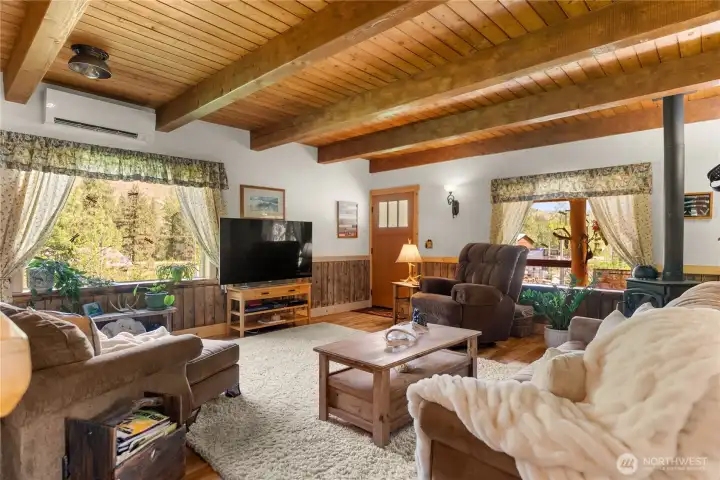 Wood ceilings in the living room make a cozy atmosphere.