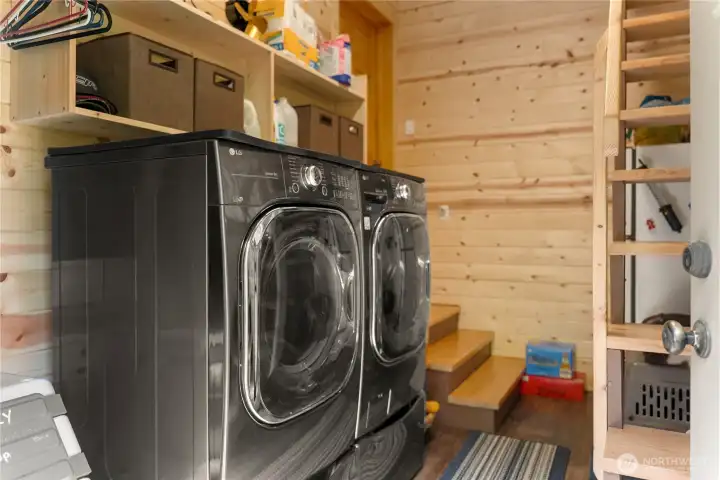 Large laundry and utility room separate from the living quarters.