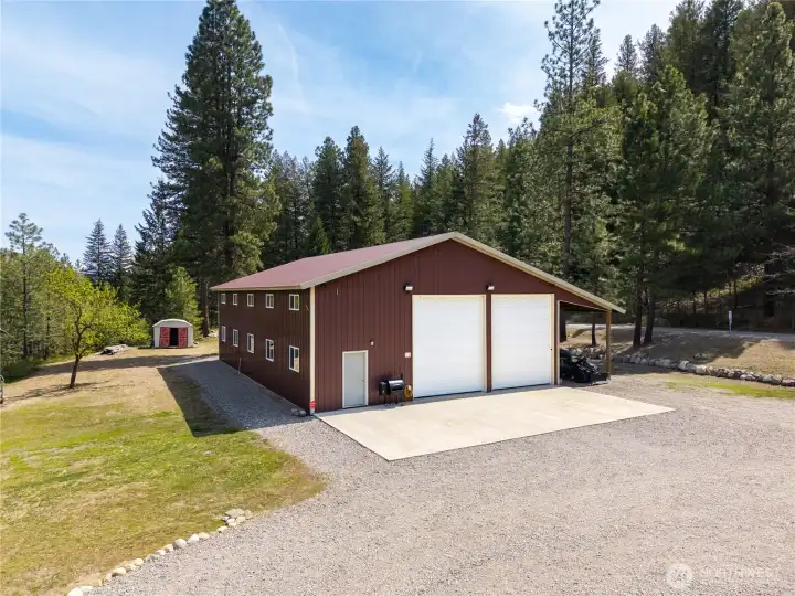 A huge 3150' garage shop with extra high doors to fit the largest of vehicles and campers.