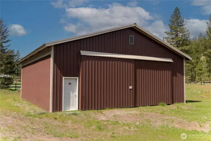 Metal siding, large front doors will securely hold all of your outdoor toys and vehicles.