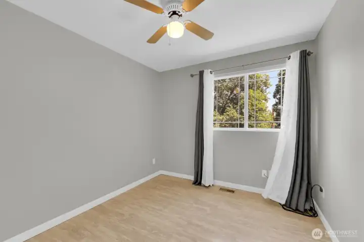 Before “Virtually Staged.” First Bedroom on left as you go up the stairs.  See next photo for “Virtually Staged.”