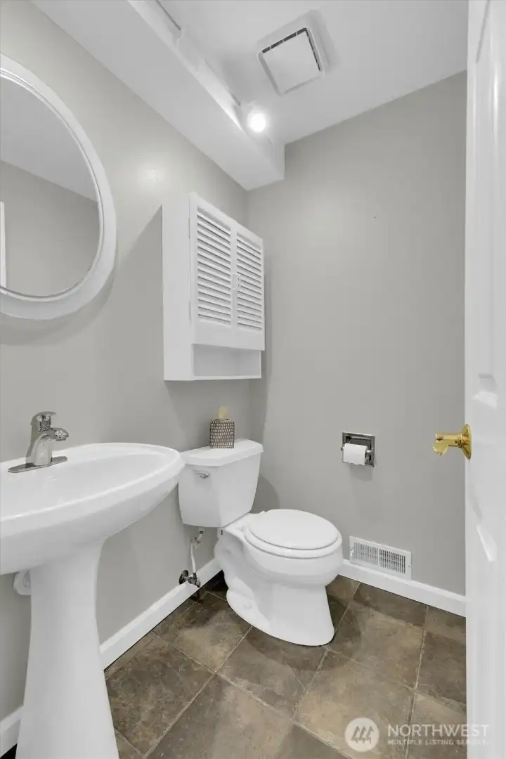 Downstairs 1/2 bath, on first floor.
