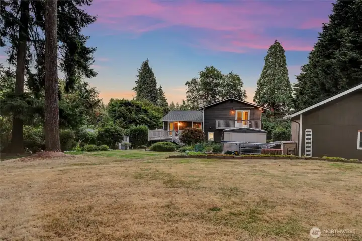 Looking at the back of house, facing East at twilight.