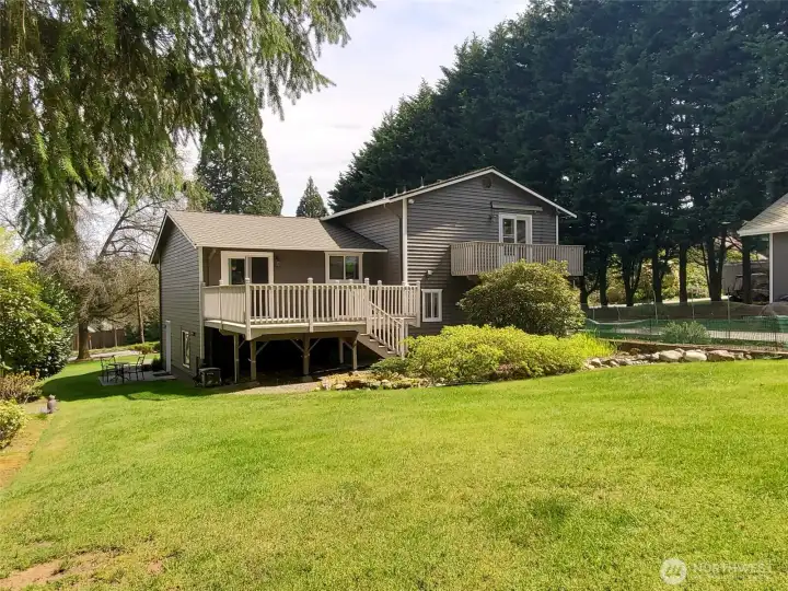 Another backyard perspective highlighting the home’s layout and usable outdoor space.