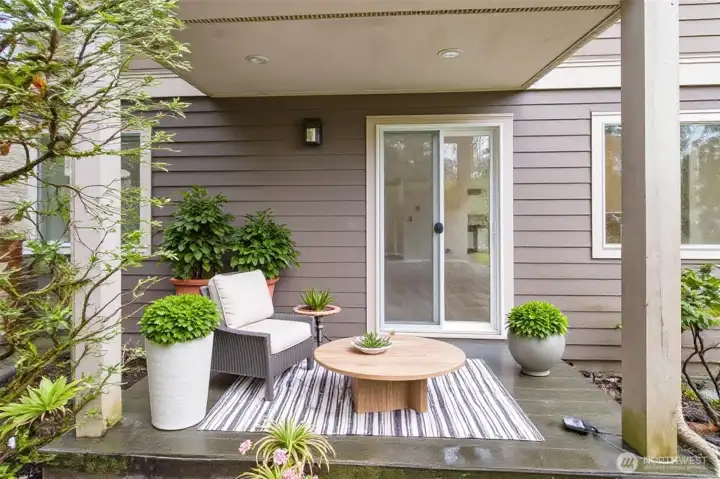 Trex deck off the living room is virtually staged.