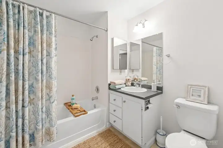 Full bathroom is virtually staged
