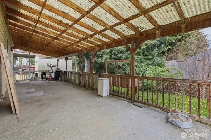 Covered back yard patio. Perfect for BBQ