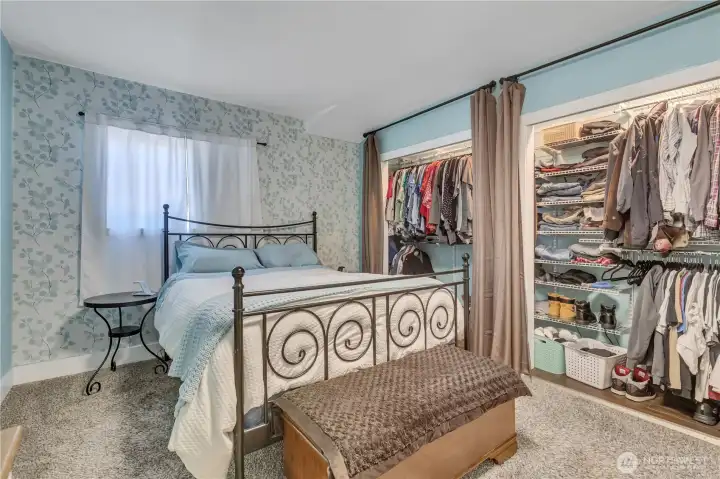 Main level bedroom showing closet shelving