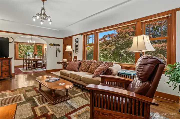 Big picture windows in the Living room, rich Mahogany trim and sturdy hardwood floors run through most of the main level. Big picture windows in the Living room, rich Mahogany trim and sturdy hardwood floors run through most of the main level.