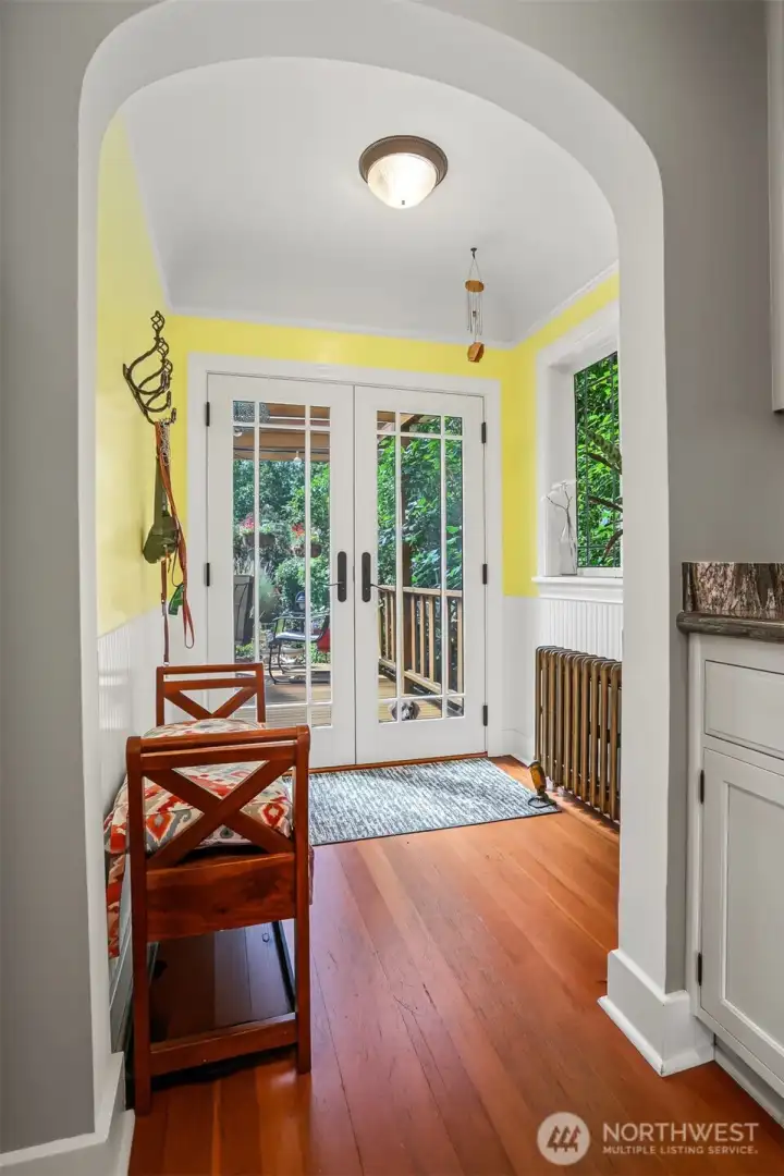 Cozy breakfast nook off the kitchen has handsome French doors out to the deck and wonderful backyard. Cozy breakfast nook off the kitchen has handsome French doors out to the deck and wonderful backyard.