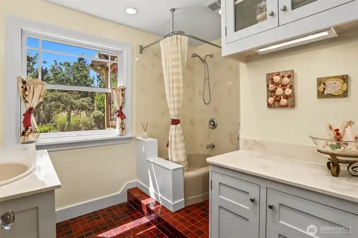 Step up bathtub and shower as well as plenty of cabinets for linens and supplies in this bathroom. Step up bathtub and shower as well as plenty of cabinets for linens and supplies in this bathroom.