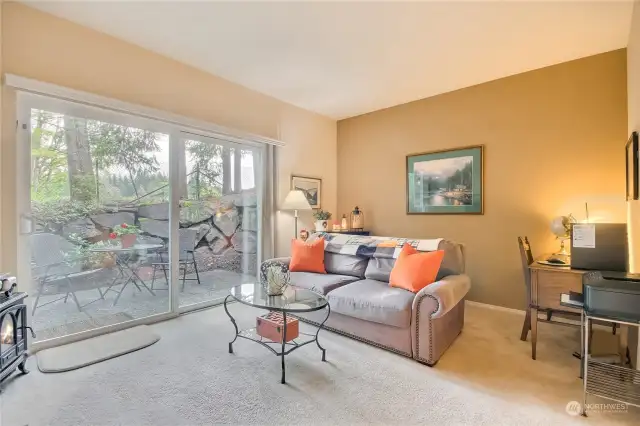 Large den/family room/2nd bedroom is privately located at the rear of condo with access to an amazing side patio to enjoy the outdoors.