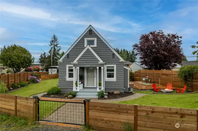 Welcome to a Classic updated Craftsmen's home on a corner/double lot! A custom fence fully encloses this stunning yard with mature landscaping. Rasberrys, apple tree and garden space.
