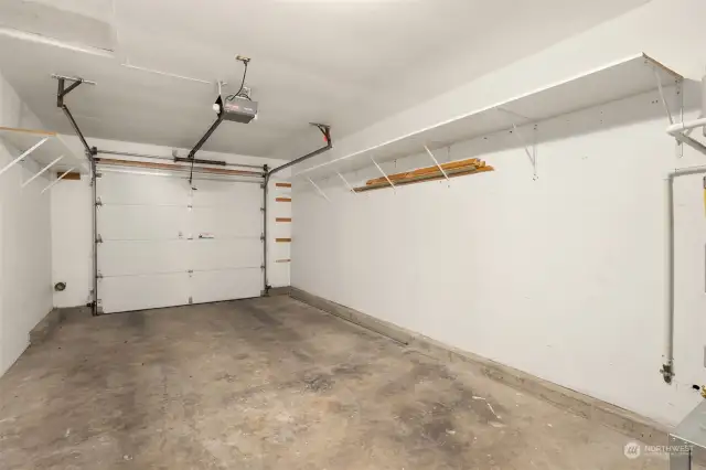 The one-car garage is very clean and has lots of room for storage. It enters into the utility room and kitchen.