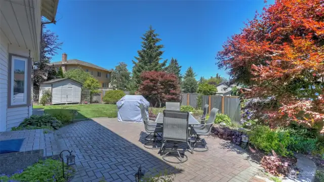 Step outside to this private back yard with two large patios, beautiful flower beds, shed and access to the walking trail located right behind your home.