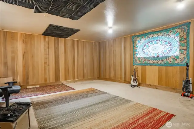 Recording Studio. Expensive Cedar Paneling and sound proofed. Could be converted back to garage space, or Primary Bedroom or use your creative imagination!