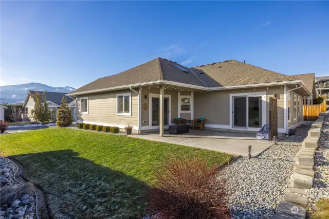 Side/Back yard & patio opens onto the open space