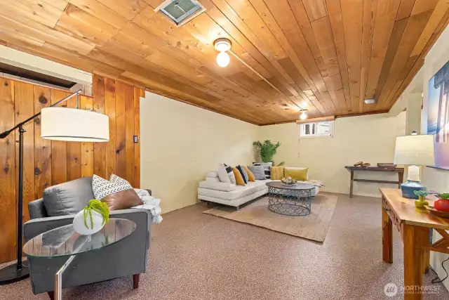 The lower level is a delightful surprise with tall, original paneled ceilings and wall, finished floors and room to roll.