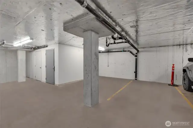 2 parking spots side by side, and the grey door on the left is your storage. All on 1st floor, as the unit. Very convenient!