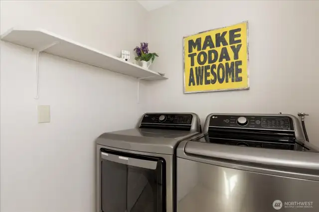 Laundry room also doubles as a mudroom with its exterior door.