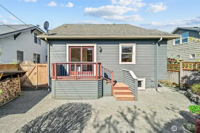 Step right out from the back Azek deck onto a spacious patio—ideal for al fresco dining or gathering with friends in your private outdoor retreat.
