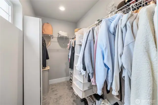Primary bed walk-in closet.