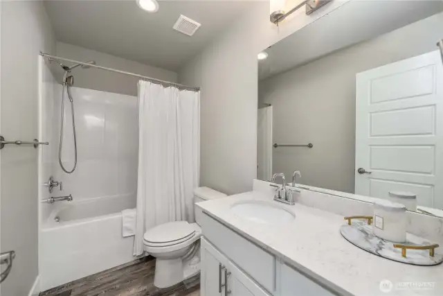 Shared full bath; upper floor.