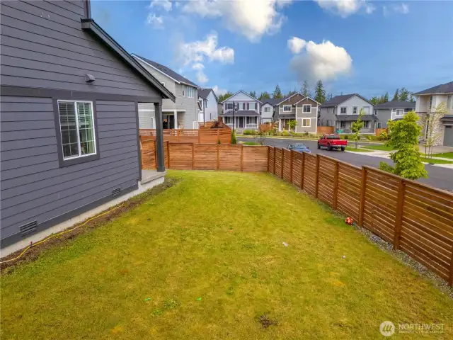 Spacious, fully fenced yard.