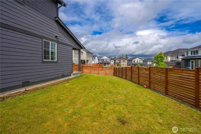 Spacious, fully fenced yard.