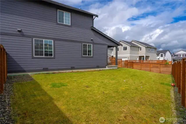 Spacious, fully fenced yard.