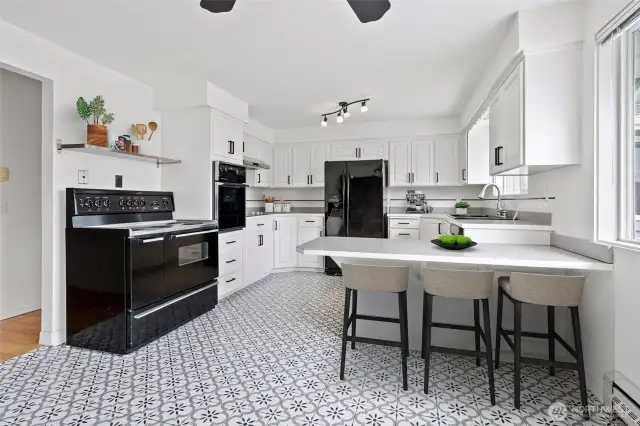 Kitchen with double oven and eating space