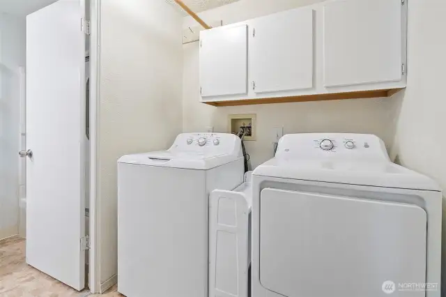 Laundry room located off of the bathroom