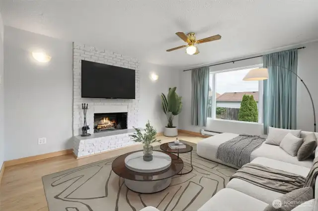 ADU - Enter into the light and bright living room with fireplace.
